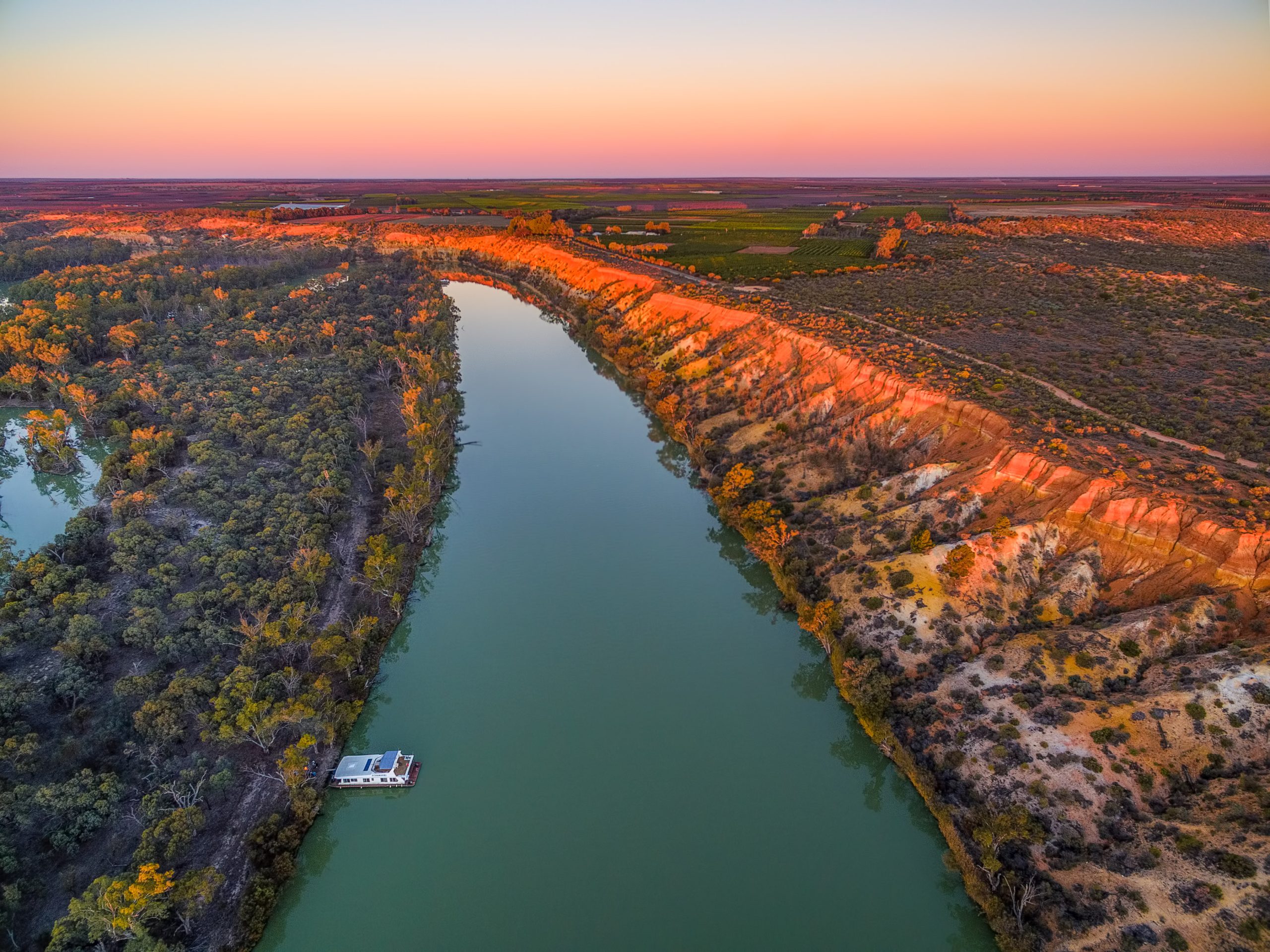 Aerial,Landscape,Of,Sandstone,Cliffs,Over,Murray,River,And,Moored